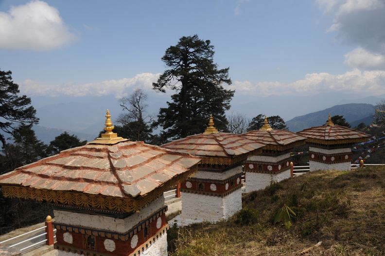 buddhist-shrine-of-108-chortens-on-the-main-highway-at-dochu-la-bhutan_6436275365_o.jpg