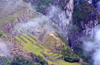 climbing-the-huayna-picchu-peak-to-overlook-macchu-picchu-early-in-the-morning-mist---peru 6447653413 o