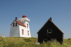 lighthouse-overlooks-the-st-lawrence-river-on-prince-edward-islands-north-shore-canada 6447567735 o